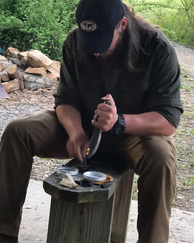 Kyle teaching fire skills